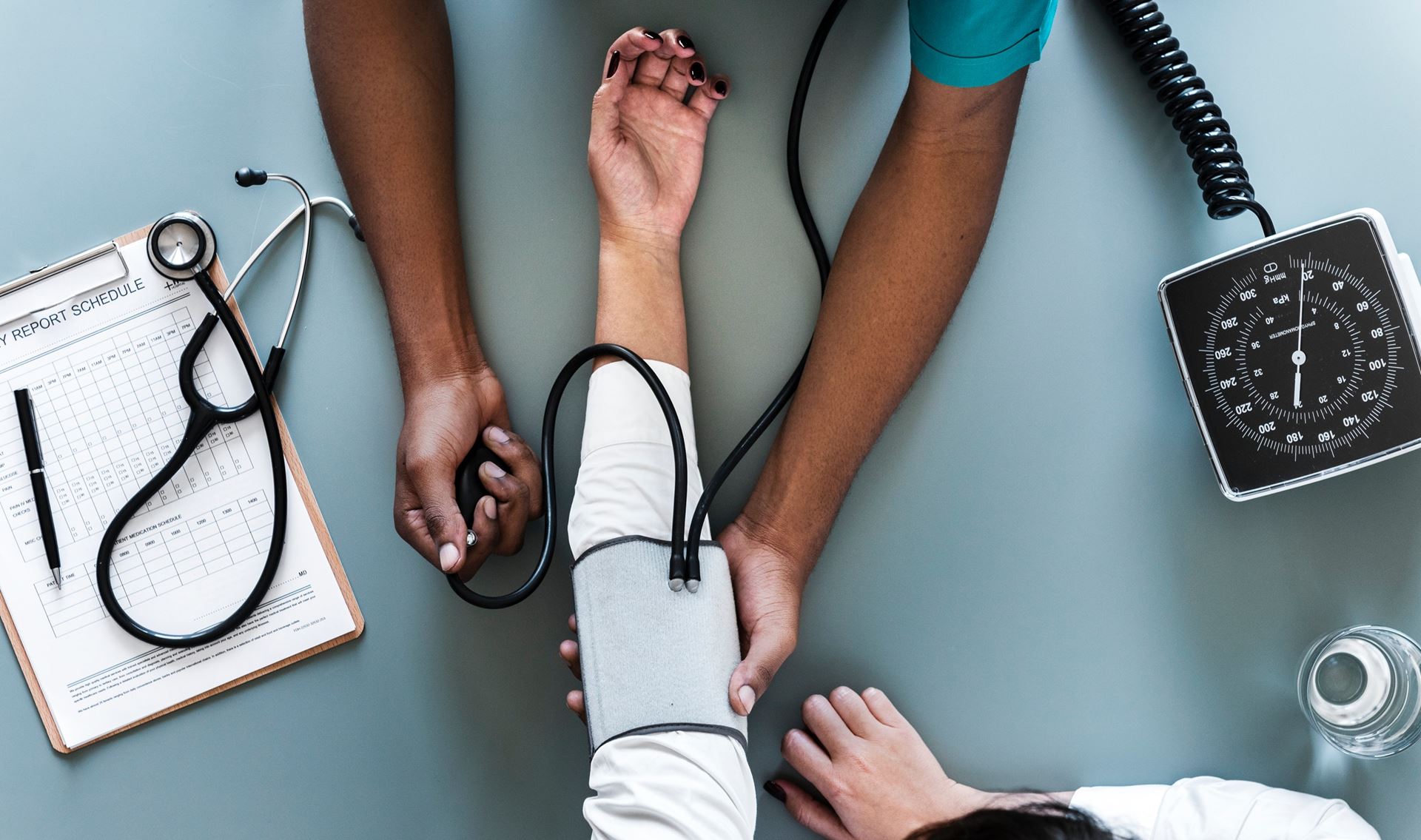 a person having their blood pressure taken